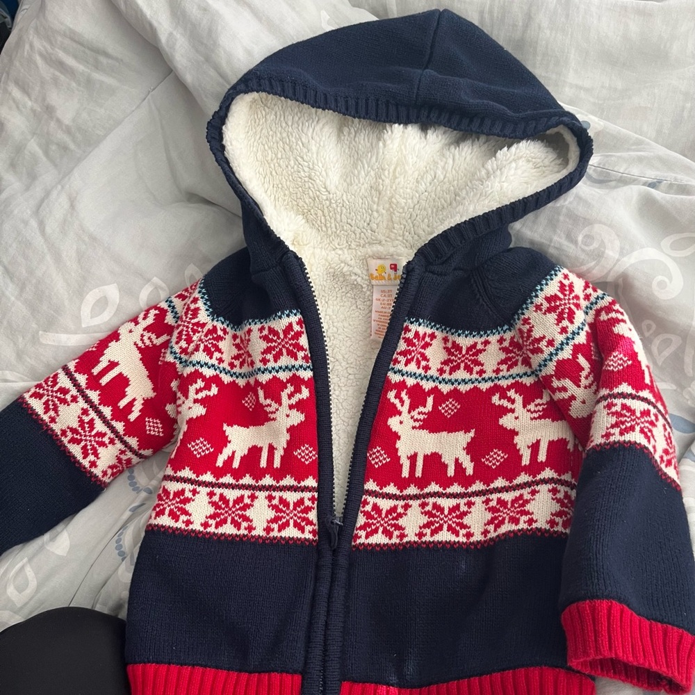Cozy Red and Navy Reindeer Hooded Sweater
Fully alpaca lined. Size 3T.